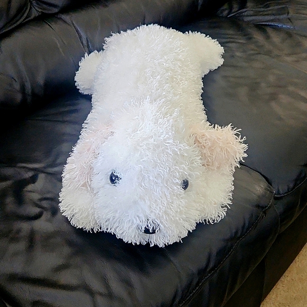 Stuffed white dog